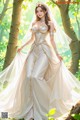 A woman in a wedding dress standing in the woods.